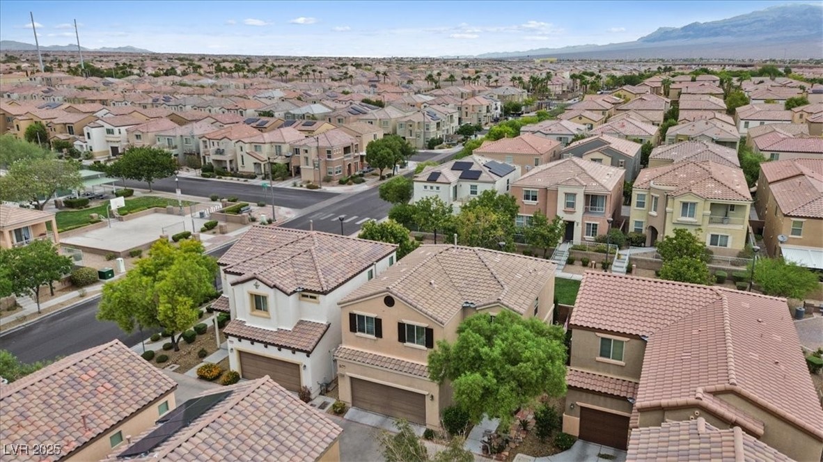9040 Magnetic Court Las Vegas, NV 89149 - Photo 39 of 43 Aerial view of residential area featuring mountains
