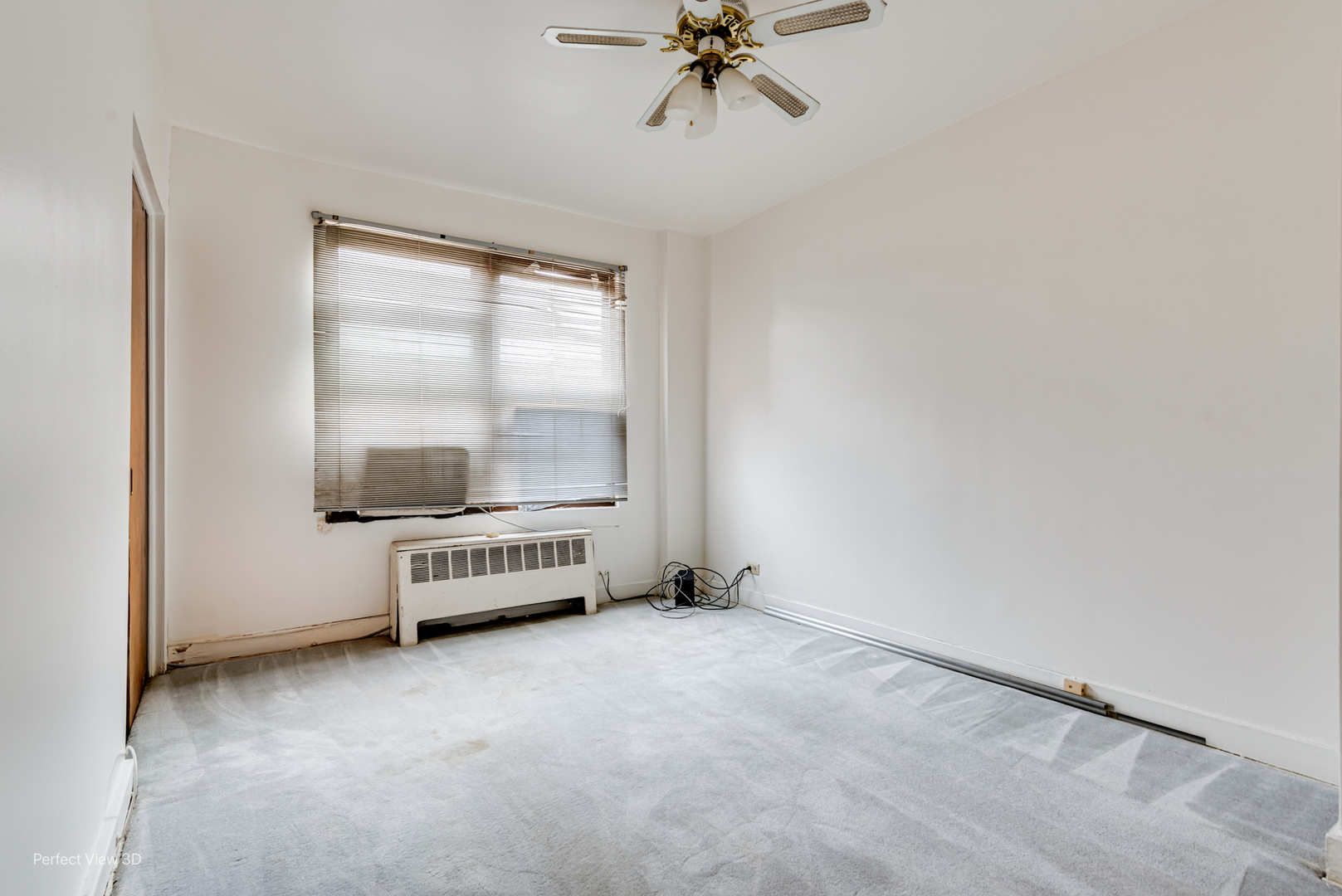6726 South Merrill Avenue Chicago, IL 60649 - Photo 11 of 22 a view of an empty room with a window