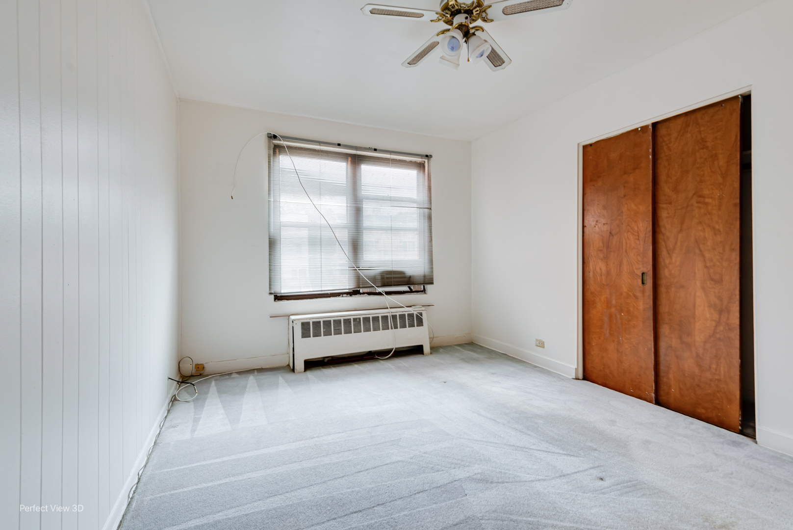 6726 South Merrill Avenue Chicago, IL 60649 - Photo 14 of 22 an empty room with a window