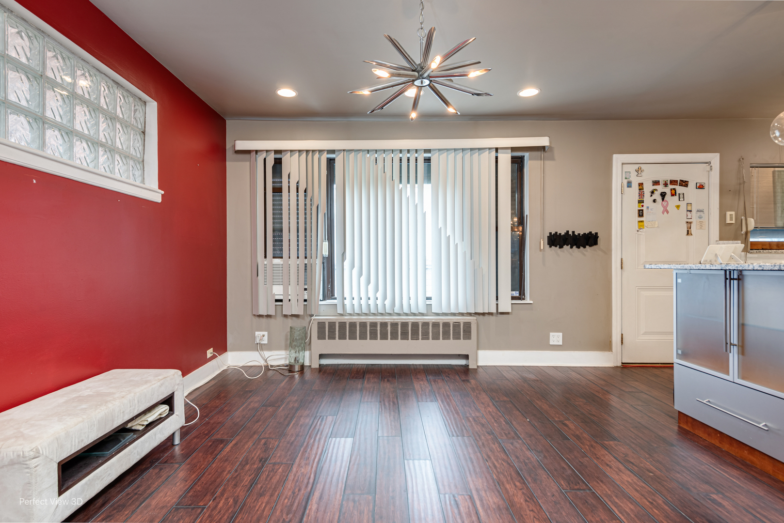 6726 South Merrill Avenue Chicago, IL 60649 - Photo 6 of 22 wooden floor in an empty room with a window