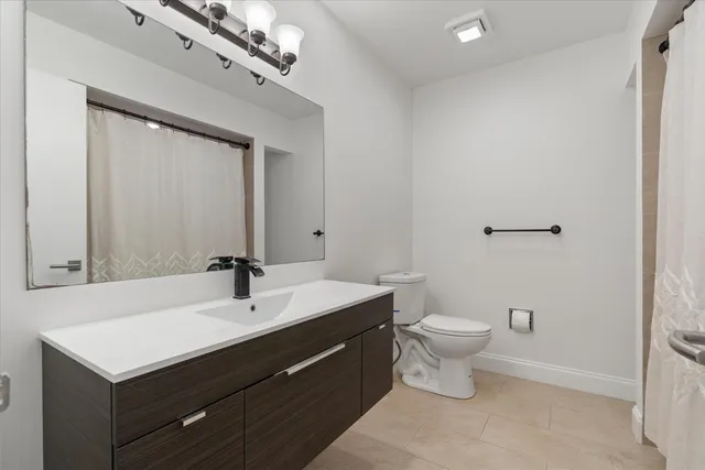 a view of a house with a garden