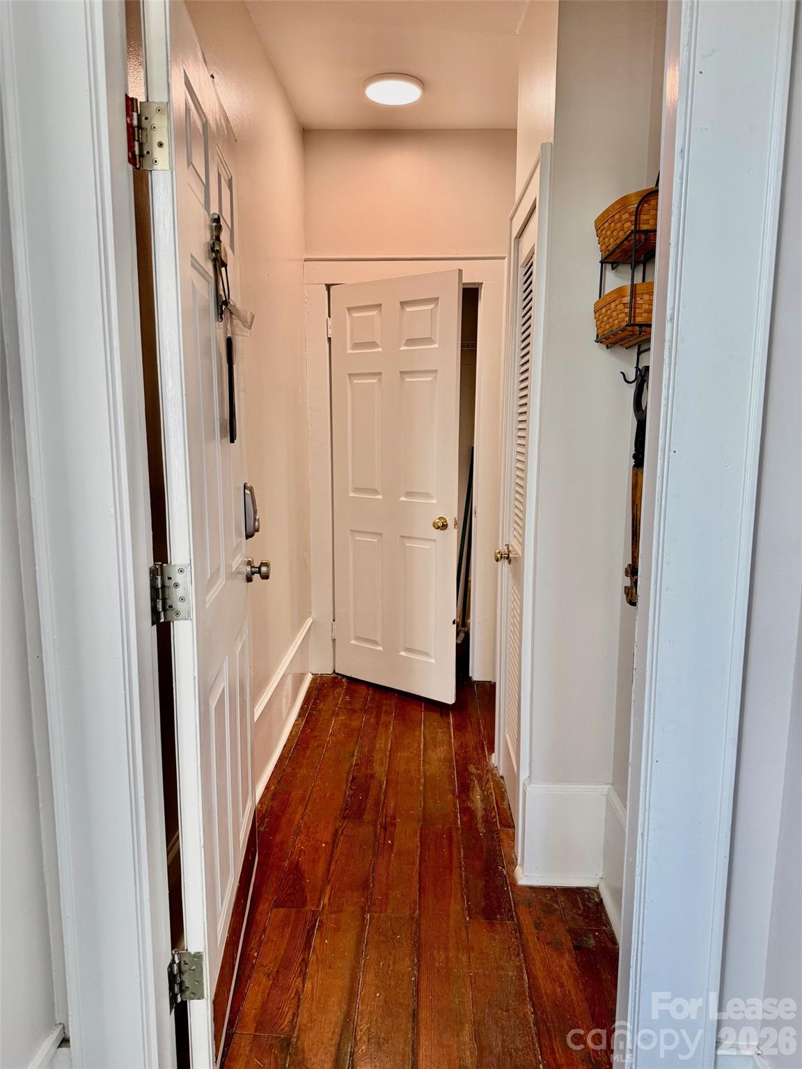 22 South Congress Street, Unit A York, SC 29745 - Photo 11 of 23 a view of a hallway with wooden floor and staircase
