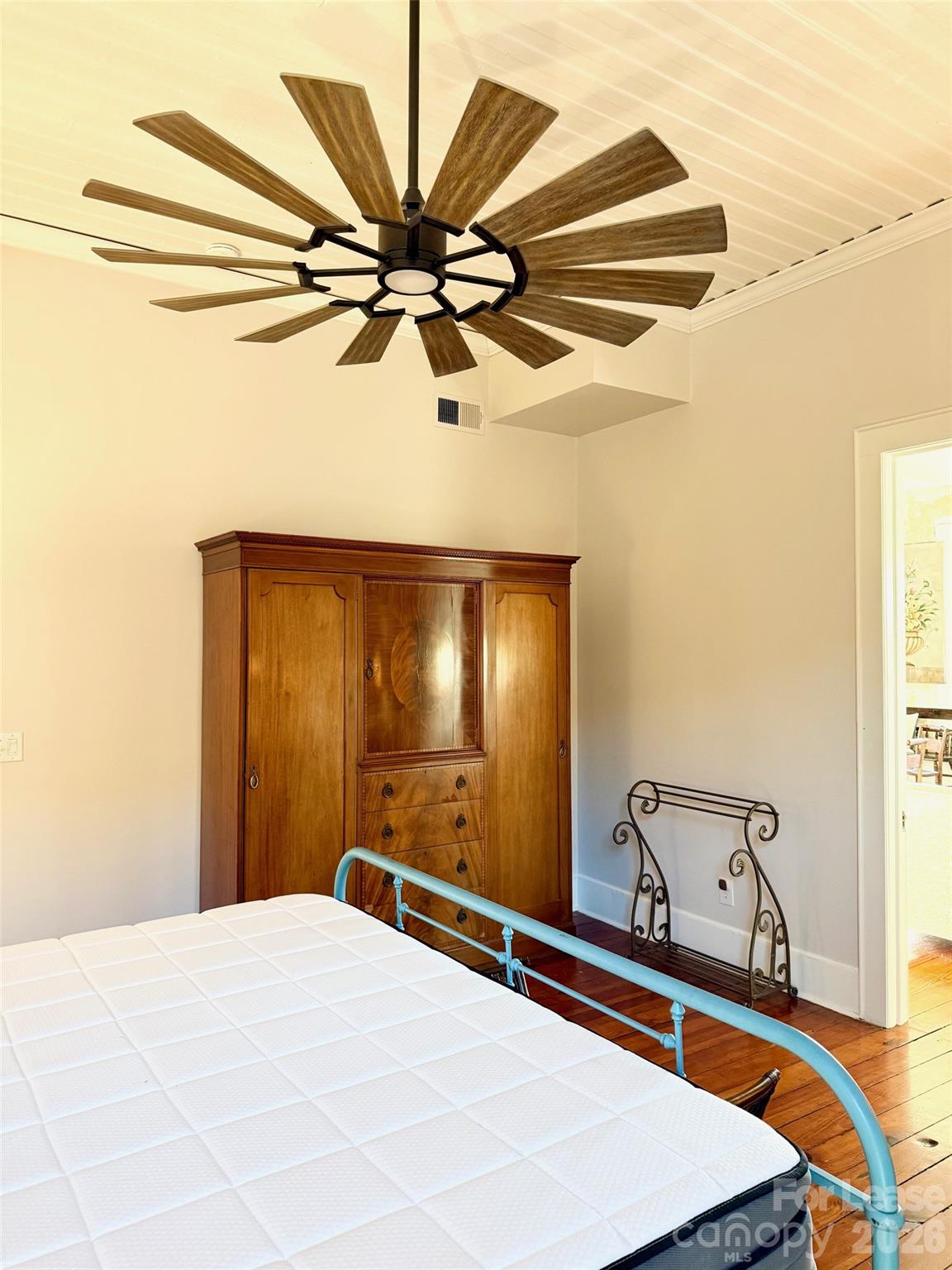 22 South Congress Street, Unit A York, SC 29745 - Photo 22 of 23 a room with a bed and ceiling fan