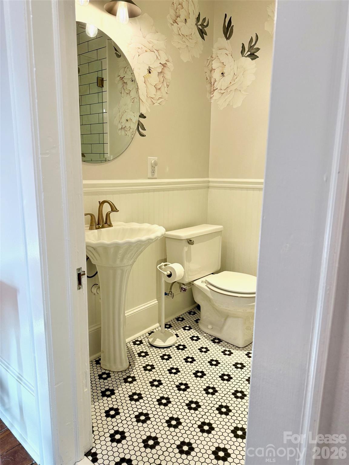22 South Congress Street, Unit A York, SC 29745 - Photo 5 of 23 a bathroom with a sink and a toilet
