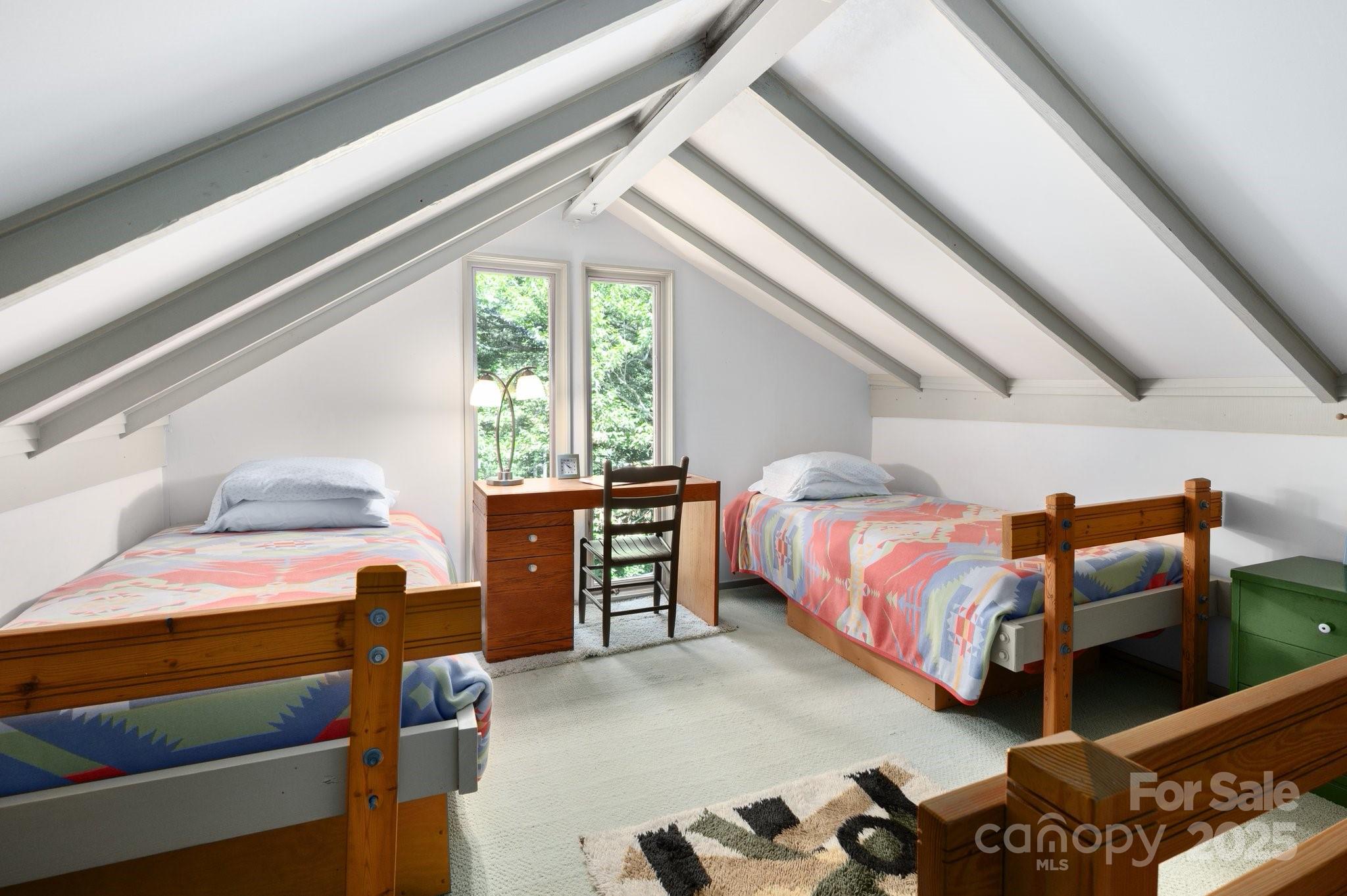 552 Averys Crk Road Arden, NC 28704 - Photo 34 of 48 a bedroom with a bed and a window