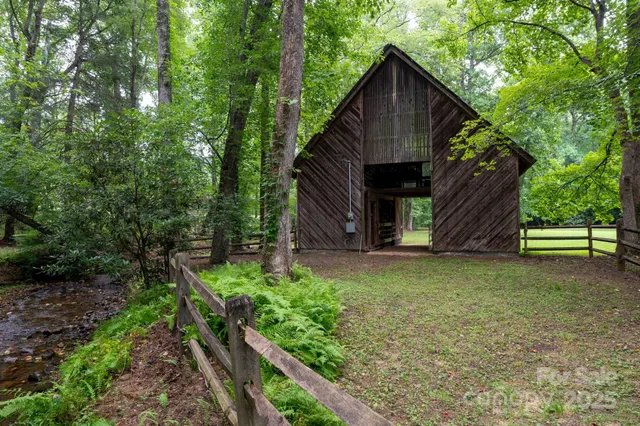 a view of an empty room with wooden walls