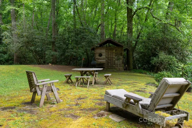 a view of a city with lush green forest