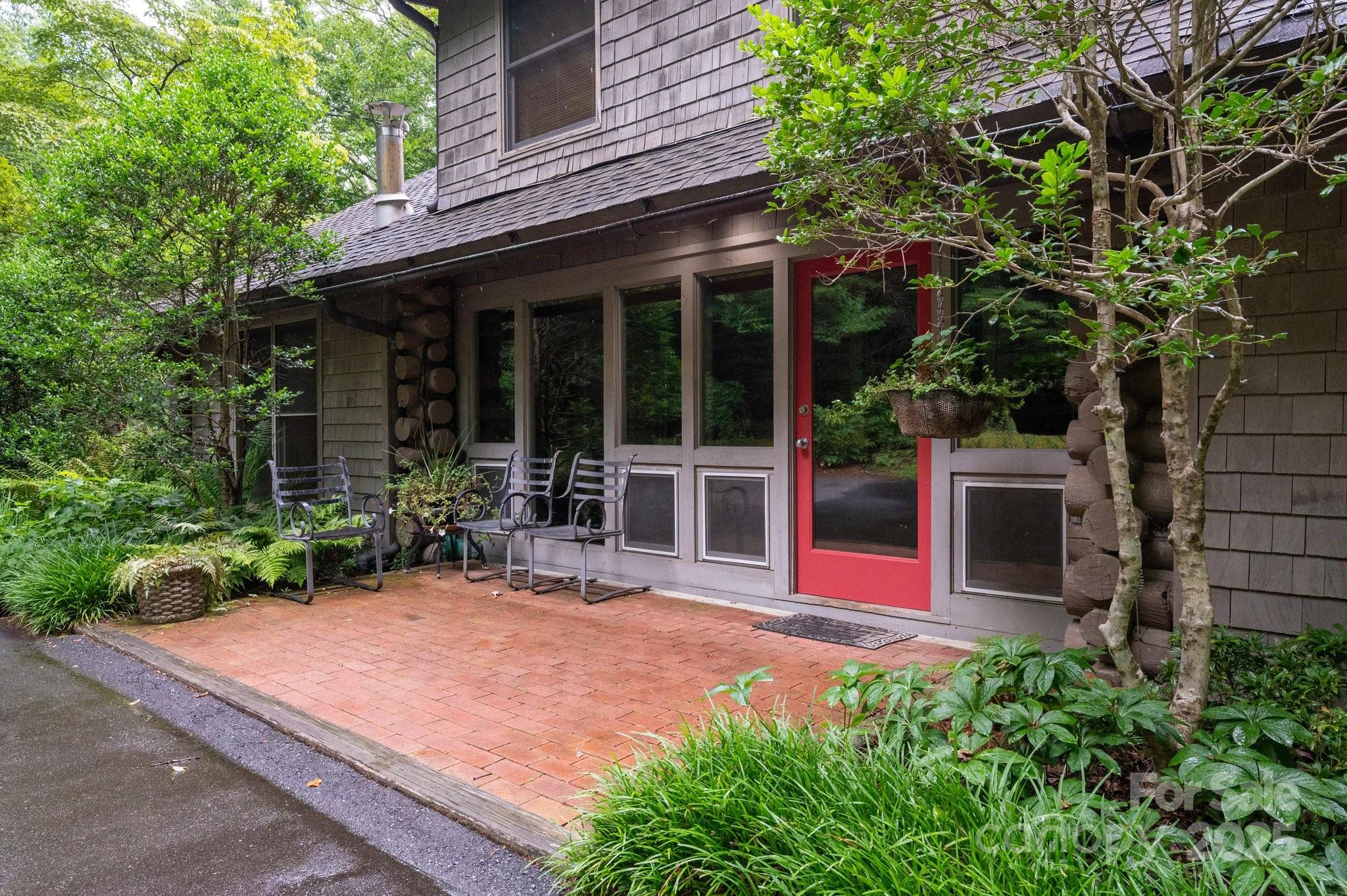 552 Averys Crk Road Arden, NC 28704 - Photo 9 of 48 front view of a house with a yard