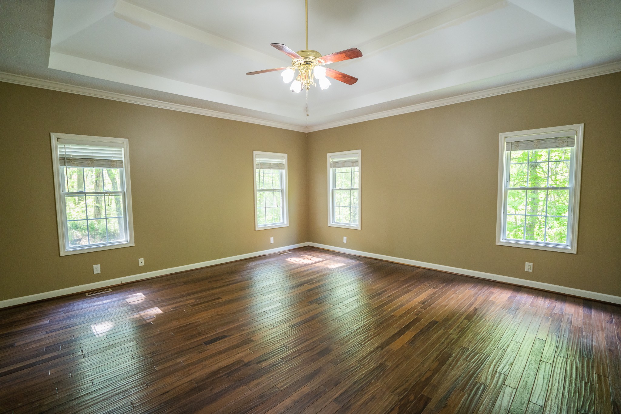 3077 Old Clarksville Sprgfld Road Adams, TN 37010 - Photo 13 of 33 a view of an empty room with window and wooden floor