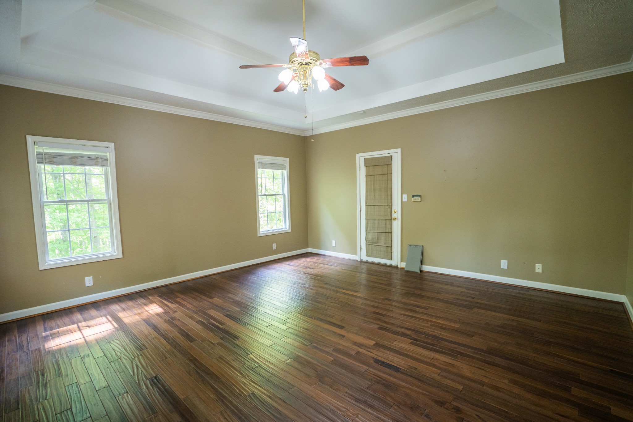 3077 Old Clarksville Sprgfld Road Adams, TN 37010 - Photo 14 of 33 a view of an empty room with window and wooden floor