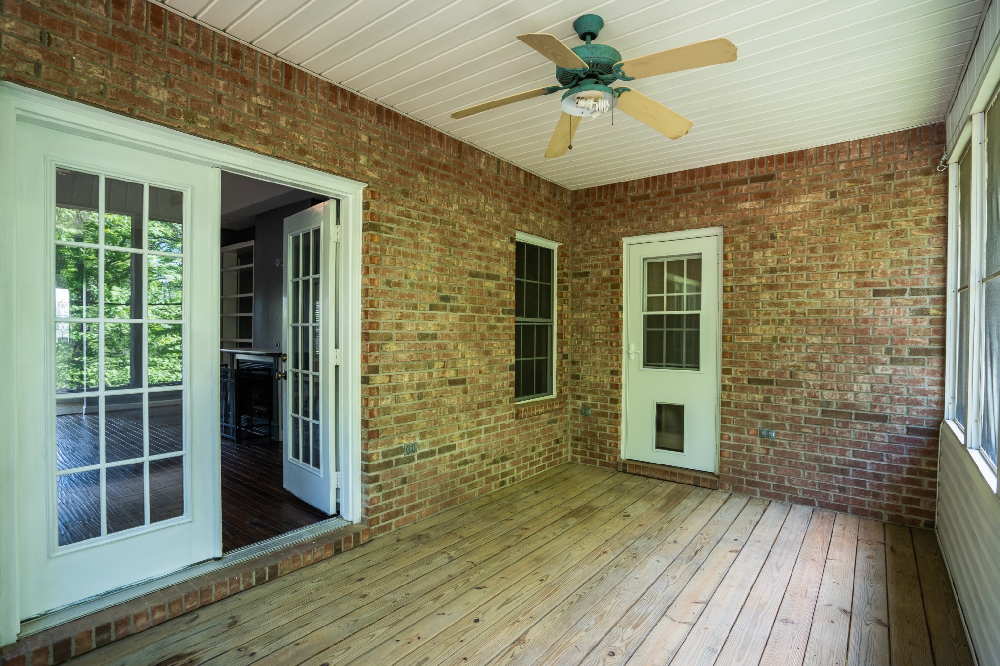 3077 Old Clarksville Sprgfld Road Adams, TN 37010 - Photo 18 of 33 a view of interior space with wooden floor and a ceiling fan