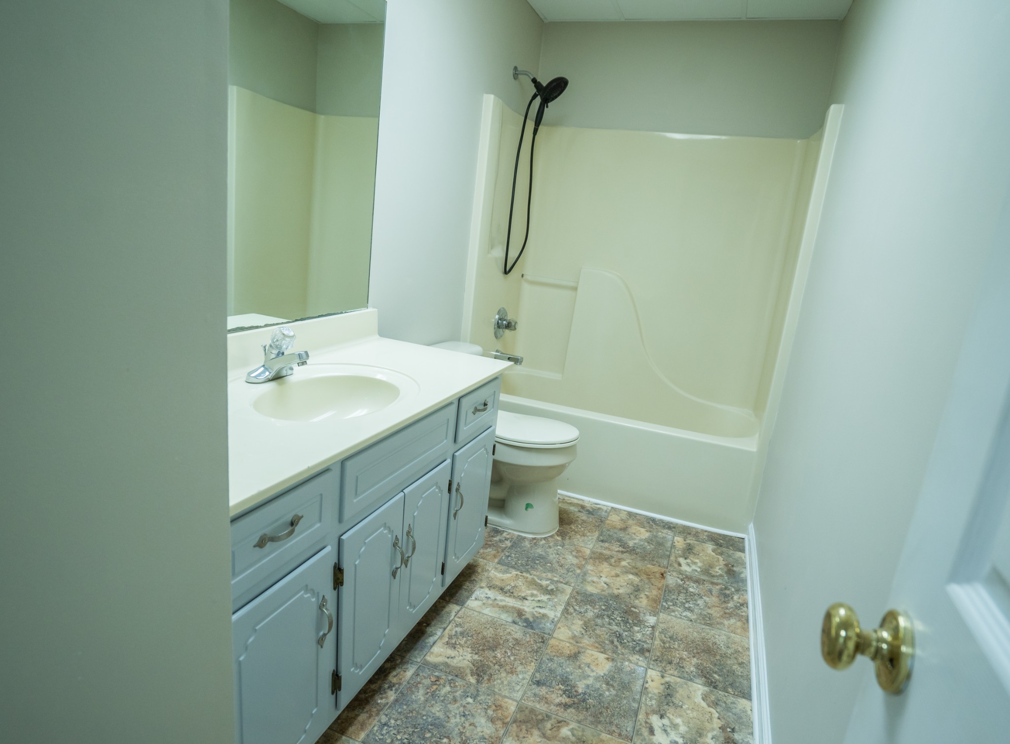3077 Old Clarksville Sprgfld Road Adams, TN 37010 - Photo 23 of 33 a bathroom with a granite countertop sink toilet and shower
