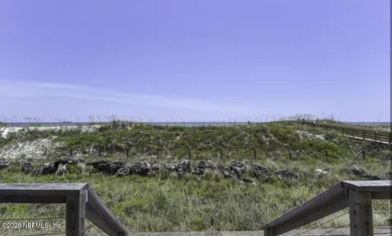 2 10th Street, Unit 2 St. Augustine Beach, FL 32080 - Photo 2 of 55 a view of a lake from a balcony