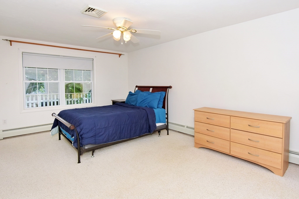 16 Sherwood Road Worcester, MA 01602 - Photo 16 of 30 a bedroom with a bed and a dresser