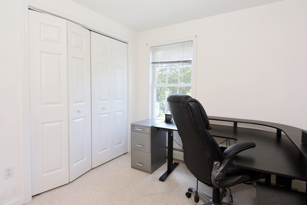 16 Sherwood Road Worcester, MA 01602 - Photo 19 of 30 a view of a workspace with furniture and a window