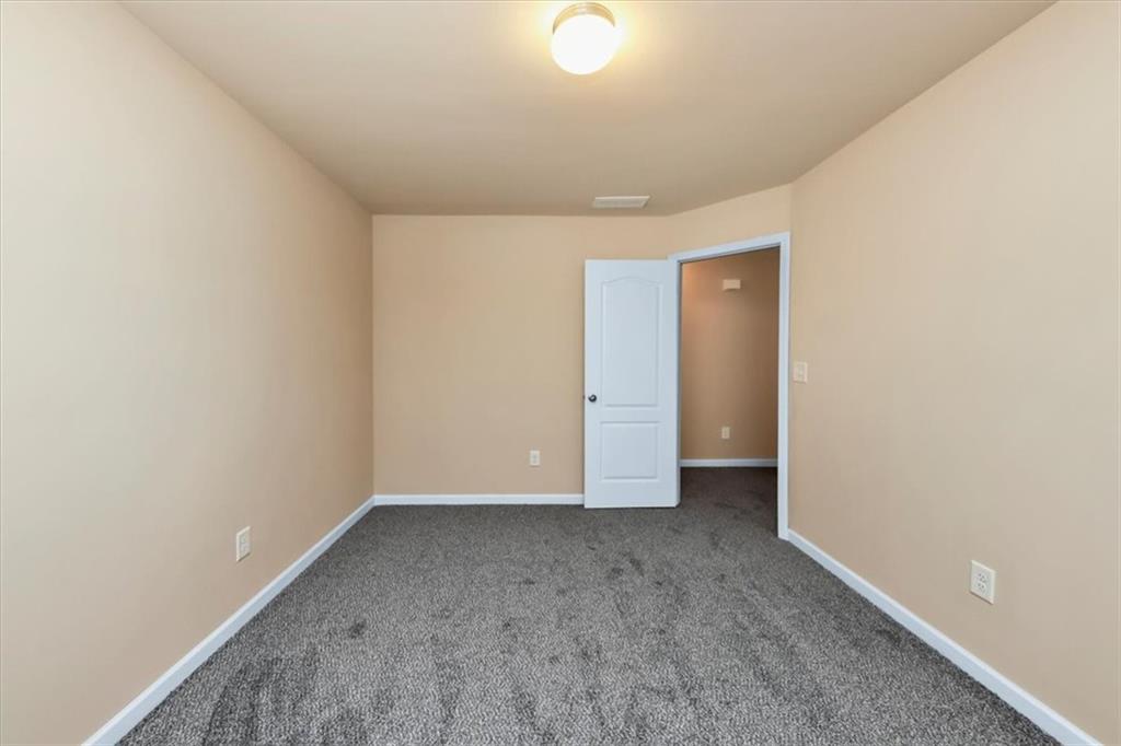182 Townview Drive Woodstock, GA 30189 - Photo 16 of 37 a view of an empty room