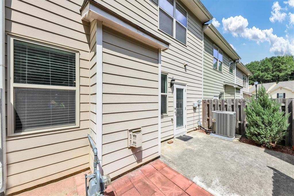 182 Townview Drive Woodstock, GA 30189 - Photo 32 of 37 a view of a house with a door and a window