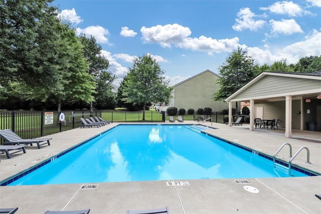 182 Townview Drive Woodstock, GA 30189 - Photo 37 of 37 a view of a house with swimming pool and sitting area