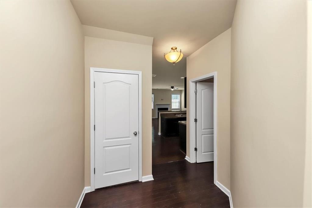 182 Townview Drive Woodstock, GA 30189 - Photo 5 of 37 a view of a kitchen from the hallway