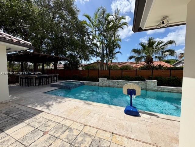 9444 Southwest 78th Street Miami, FL 33173 - Photo 10 of 11 a front view of a house with garden