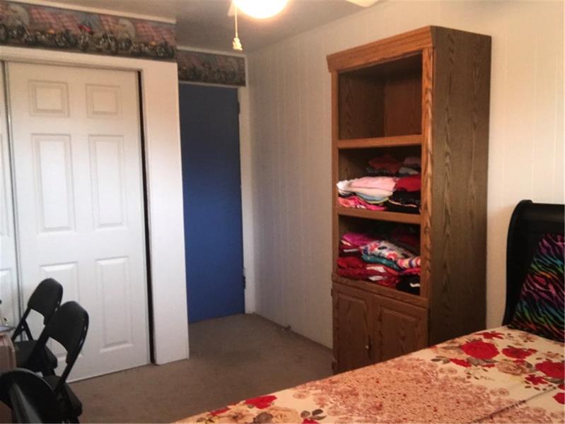 317 West Bruceton Road Pittsburgh, PA 15236 - Photo 13 of 22 Third bedroom on the main floor with large cupboard.