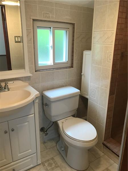 317 West Bruceton Road Pittsburgh, PA 15236 - Photo 18 of 22 Upstairs bathroom with ceramic tile shower.