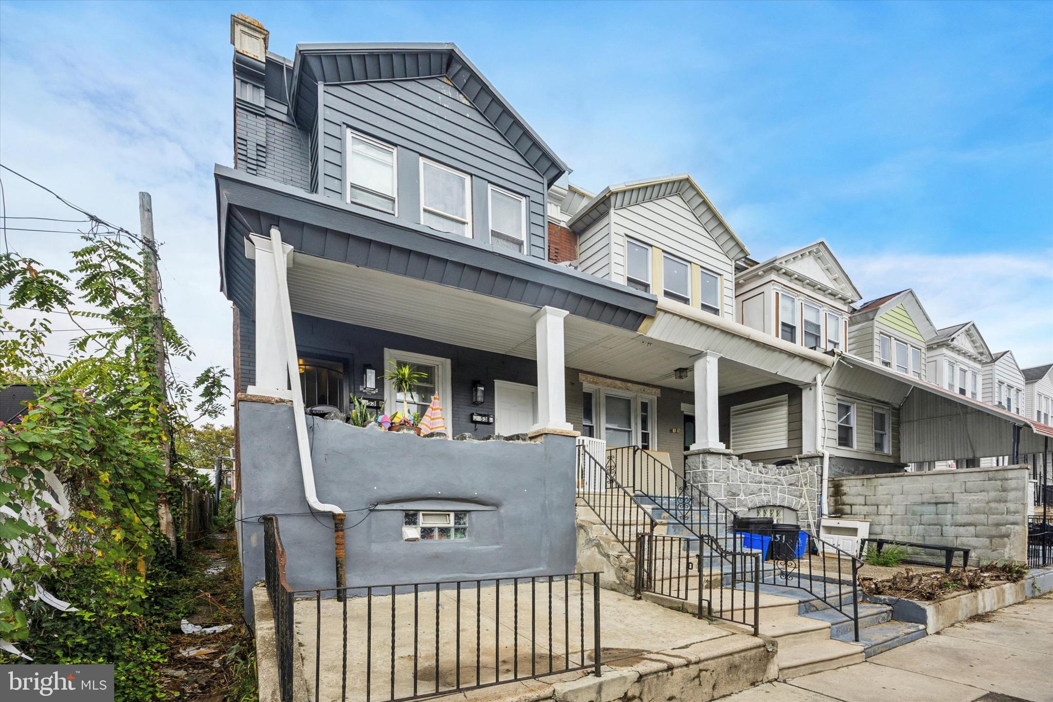 a front view of a house with glass windows