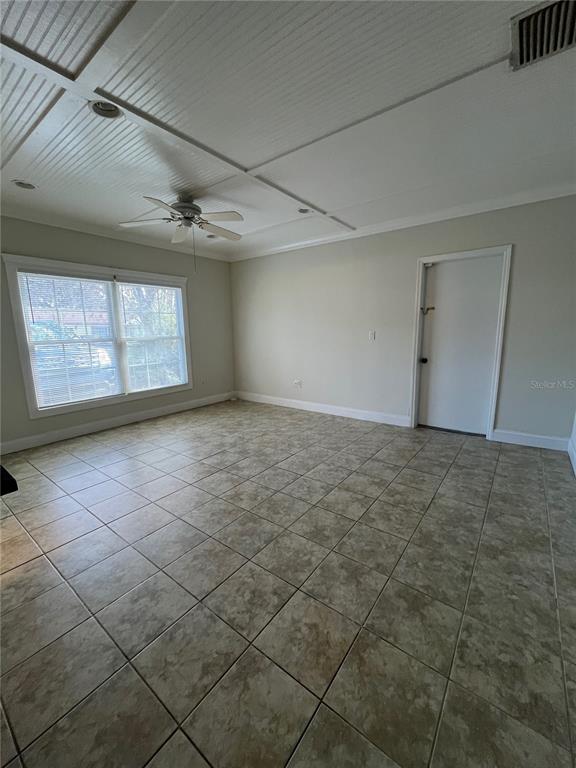 3222 Hammersmith Road Orlando, FL 32818 - Photo 13 of 29 a view of an empty room with windows