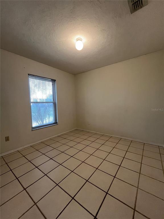 3222 Hammersmith Road Orlando, FL 32818 - Photo 24 of 29 a view of an empty room and window