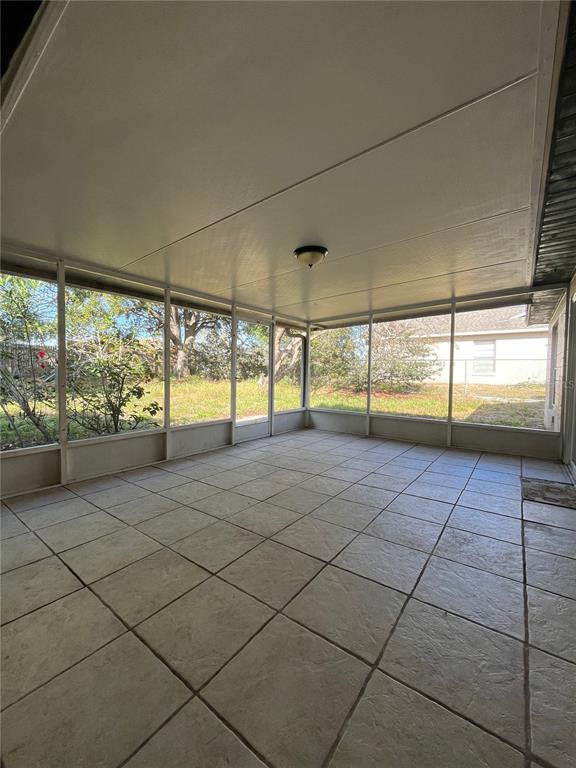 3222 Hammersmith Road Orlando, FL 32818 - Photo 28 of 29 a view of an empty room with a large window