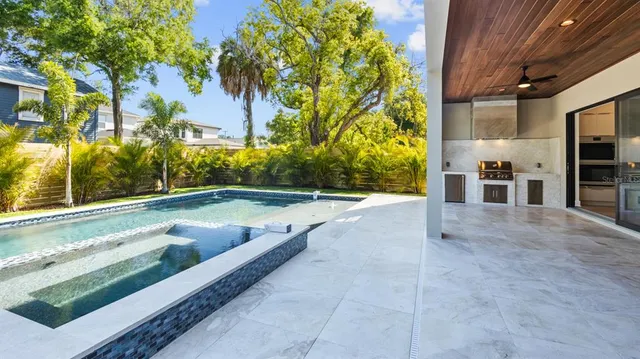 a view of swimming pool with a yard