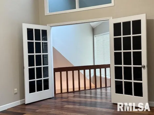 an empty room with windows