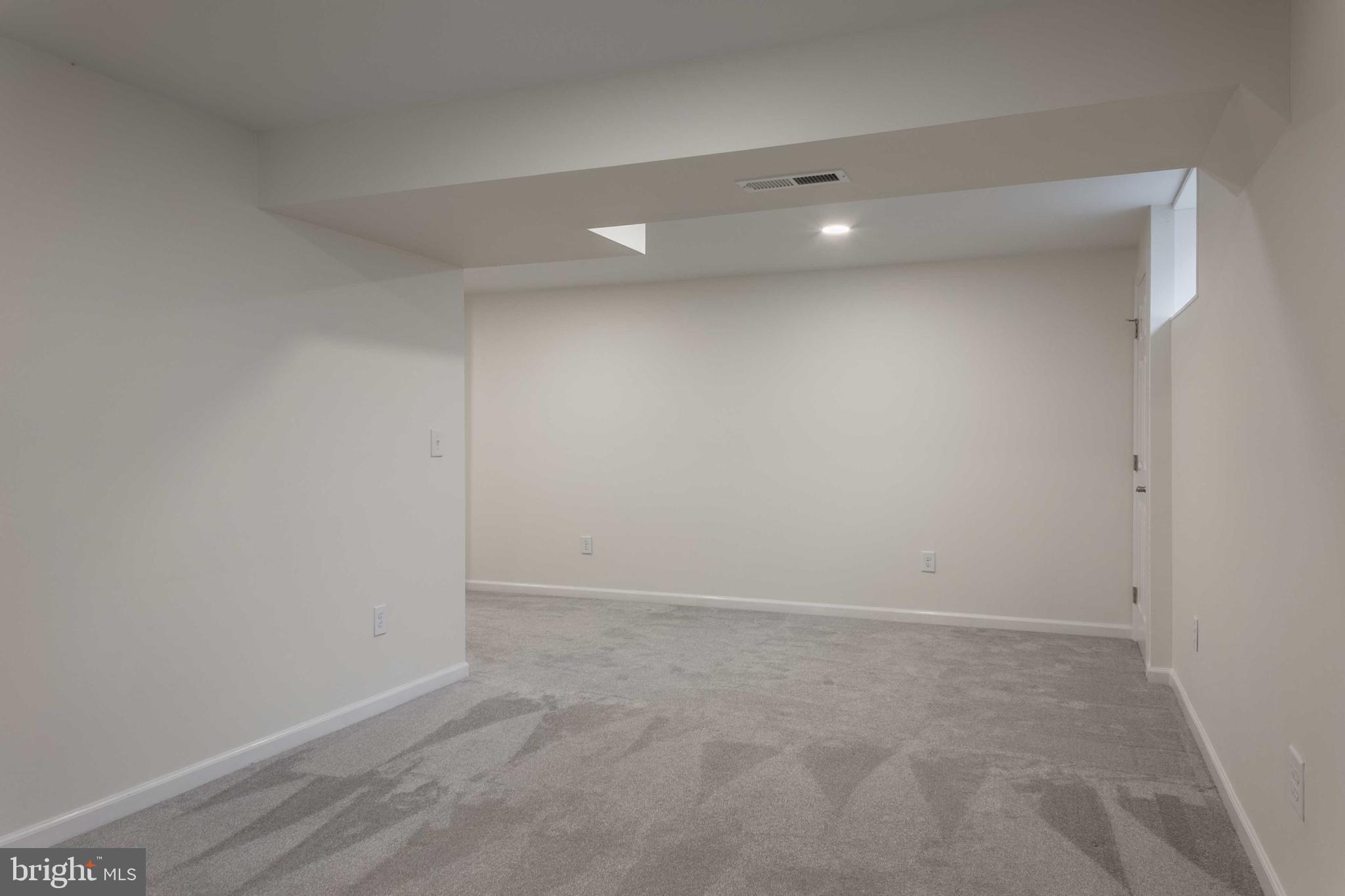 7206 Rainbow Lane Frederick, MD 21702 - Photo 31 of 53 Partially finished basement