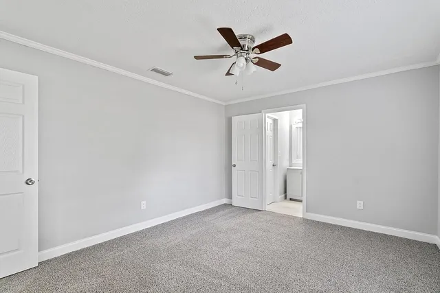 a view of a big room with closet and wooden floor