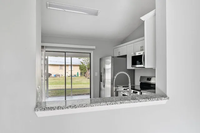 a room with furniture and a window