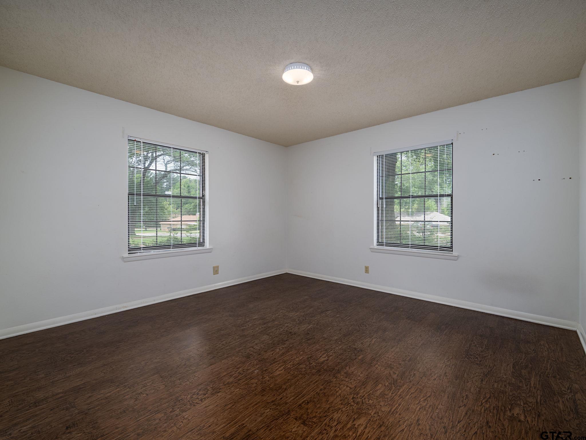2513 Merry Lane Tyler, TX 75701 - Photo 19 of 26 an empty room with windows