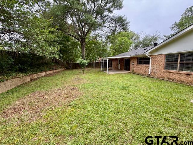 2513 Merry Lane Tyler, TX 75701 - Photo 25 of 26 a front view of house with yard and trees