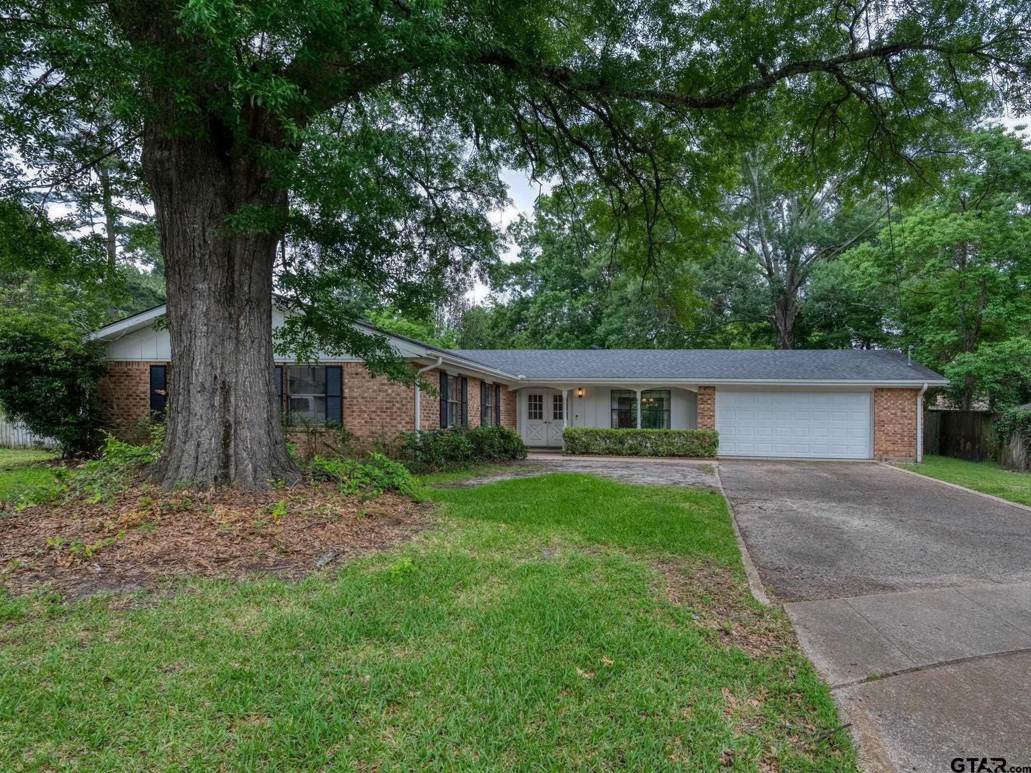 2513 Merry Lane Tyler, TX 75701 - Photo 3 of 26 a view of a house with a yard