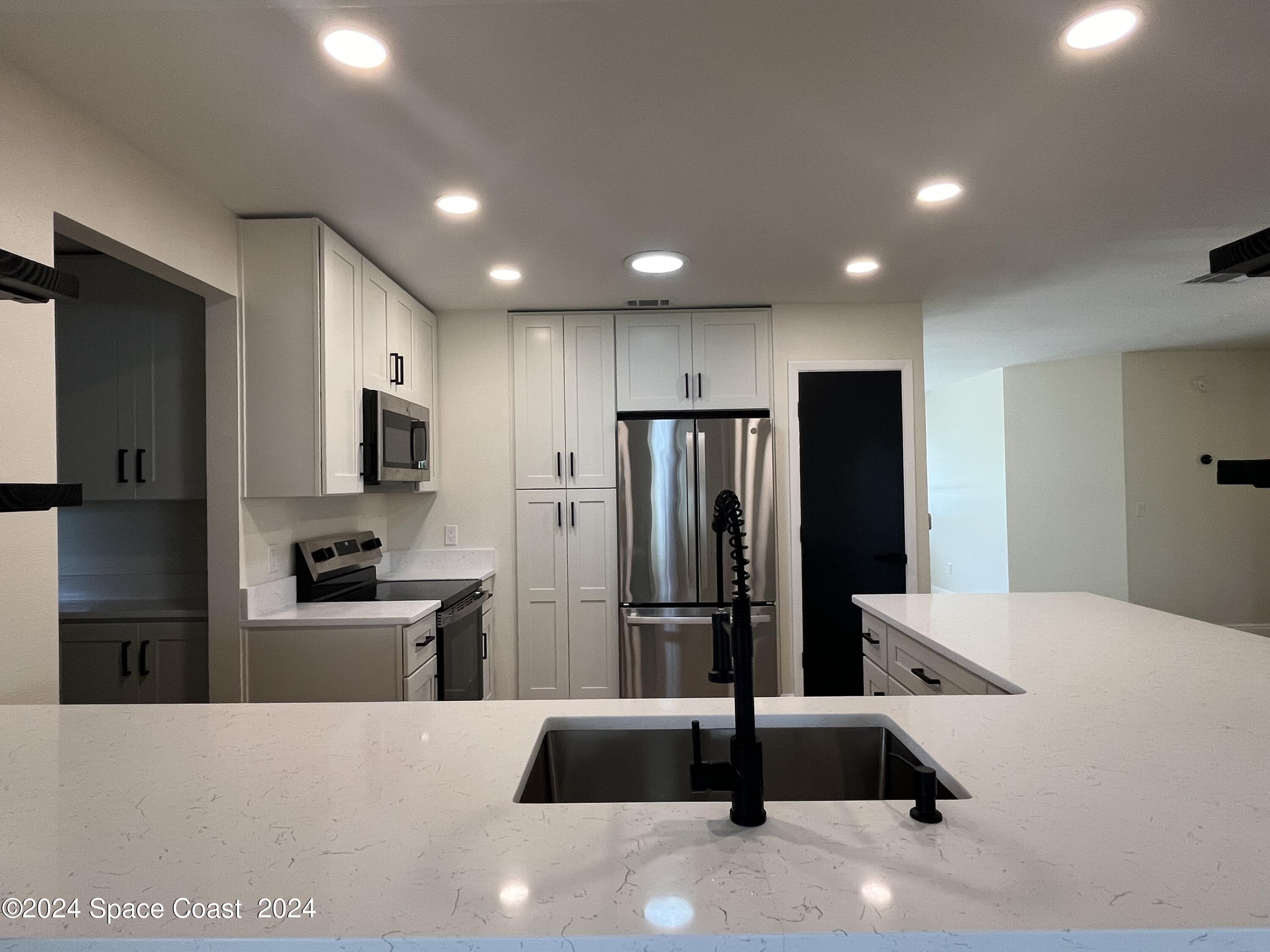 1171 Riviera Drive Northeast Palm Bay, FL 32905 - Photo 11 of 31 Photo Sep 14 2024, 1 36 09 PM
