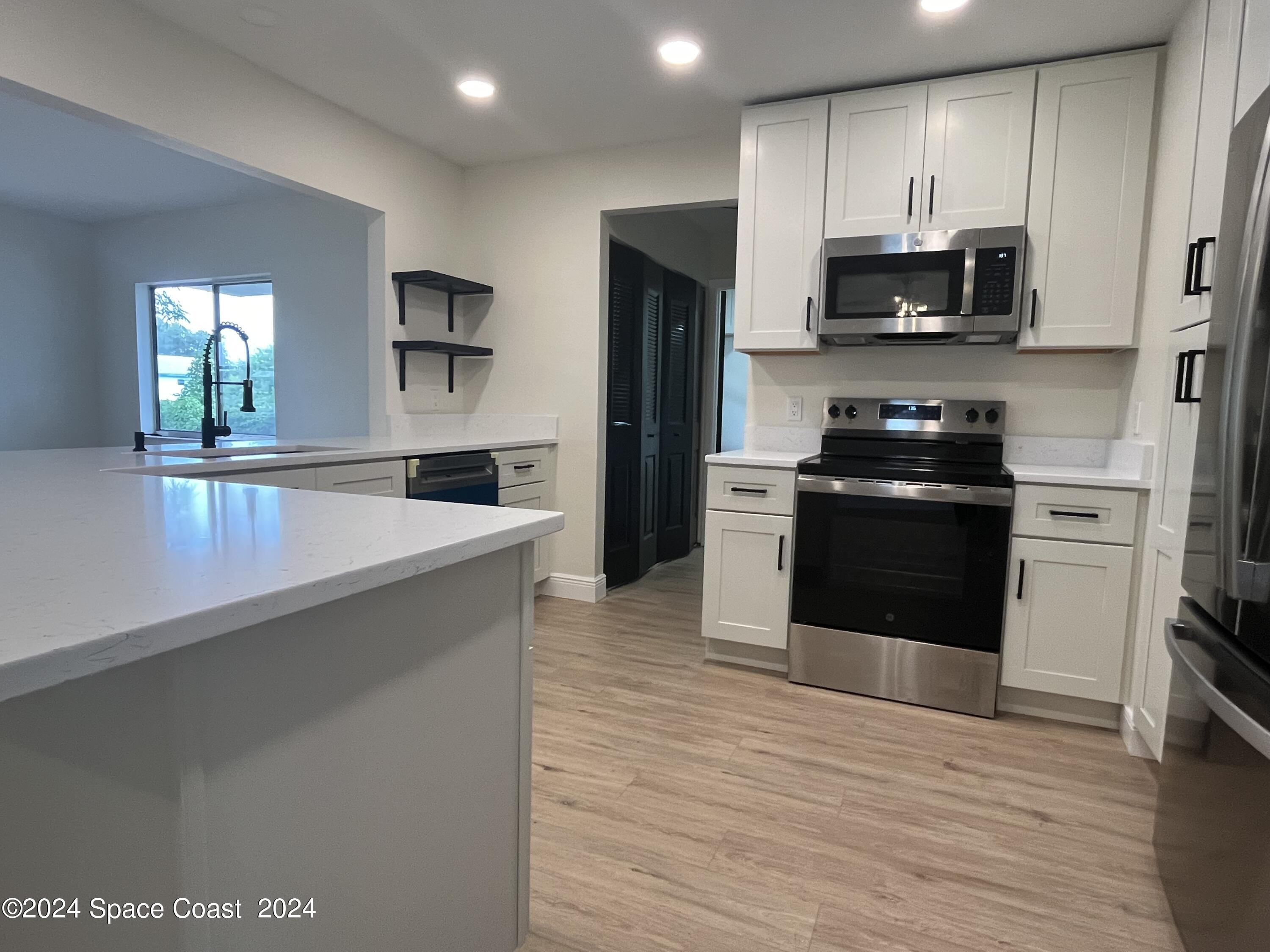 1171 Riviera Drive Northeast Palm Bay, FL 32905 - Photo 9 of 31 Photo Sep 14 2024, 1 38 32 PM