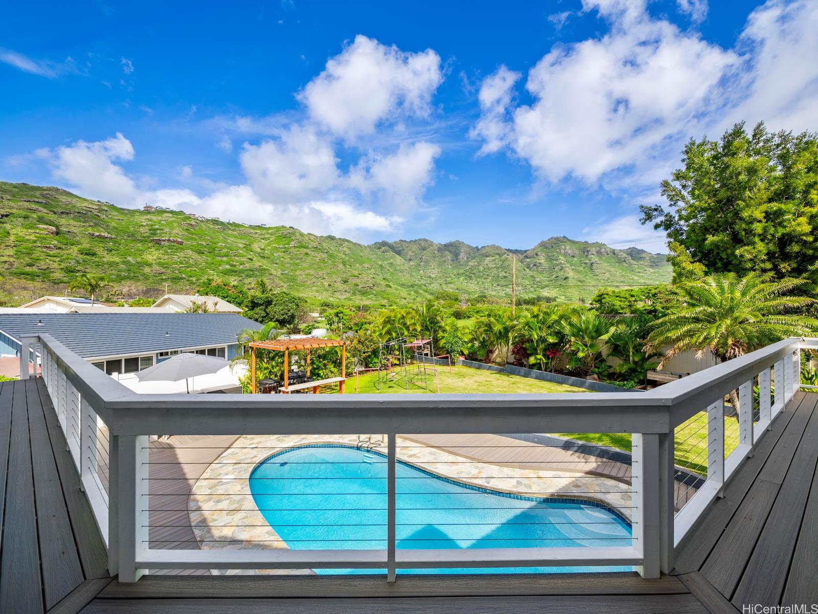 6815 Niumalu Loop Honolulu, HI 96825 - Photo 24 of 25 The gorgeous mountain views from the 2nd floor wraparound deck just outside the Primary Suite