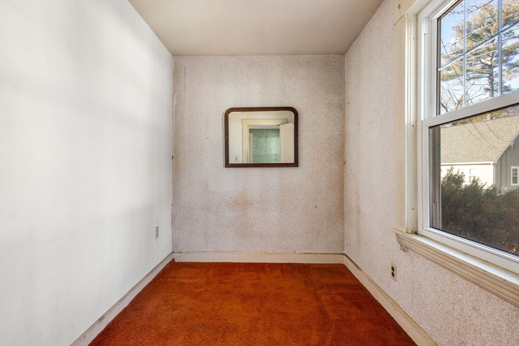 28 Birch Road Natick, MA 01760 - Photo 11 of 19 a view of a hallway with a window