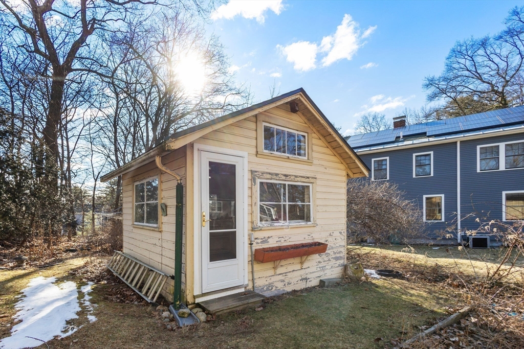 28 Birch Road Natick, MA 01760 - Photo 17 of 19 a view of a house with a yard