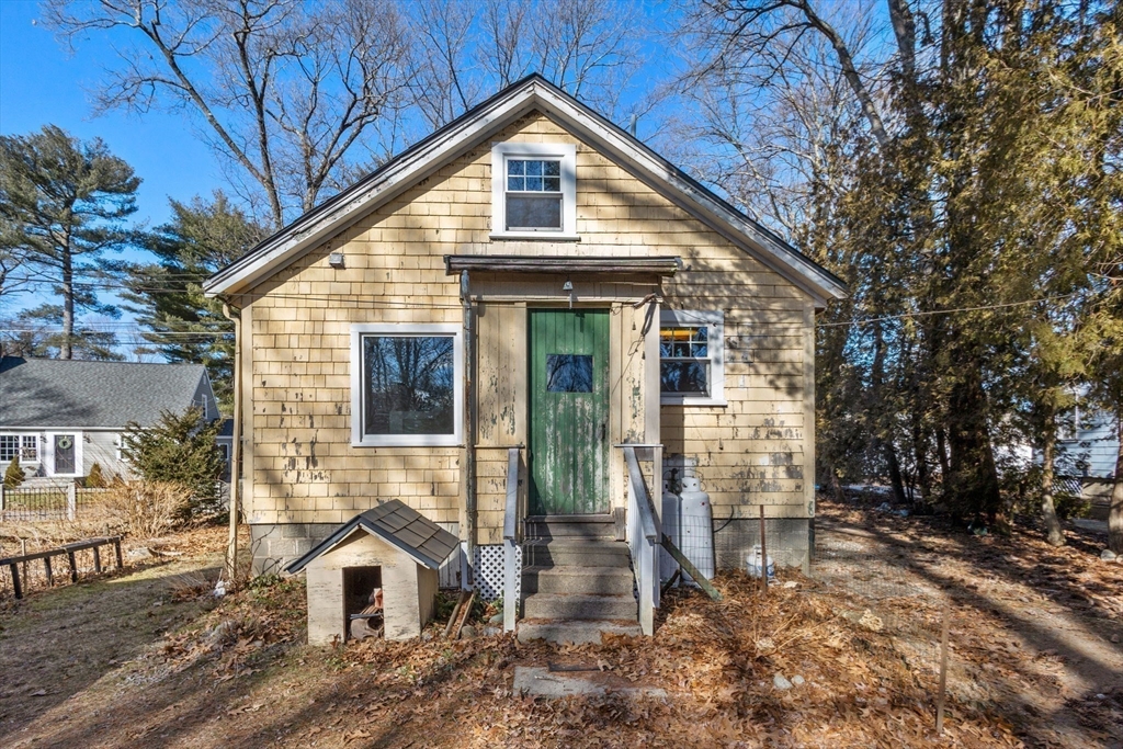28 Birch Road Natick, MA 01760 - Photo 19 of 19 a front view of a house with a yard