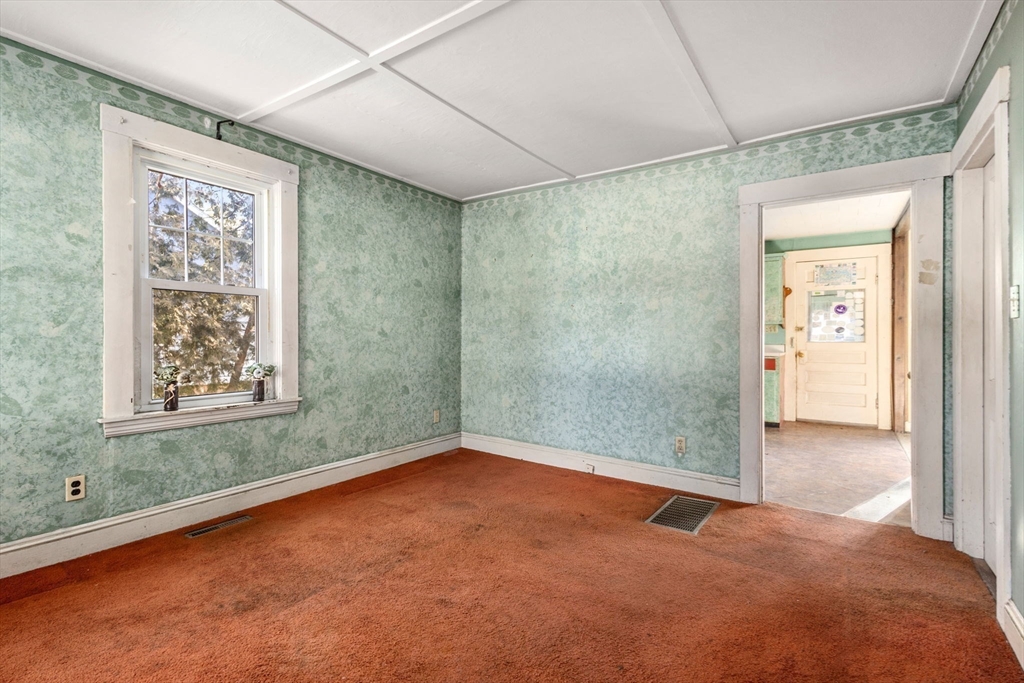 28 Birch Road Natick, MA 01760 - Photo 5 of 19 an empty room with a empty space and windows
