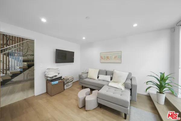 a bedroom with a bed and a closet