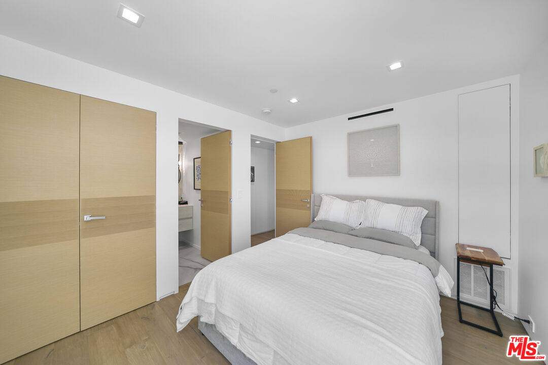 1500 Ocean Drive Oxnard, CA 93035 - Photo 17 of 75 a bedroom with a bed and a closet