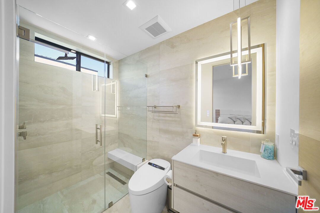 1500 Ocean Drive Oxnard, CA 93035 - Photo 40 of 75 a bathroom with a sink toilet tub and shower