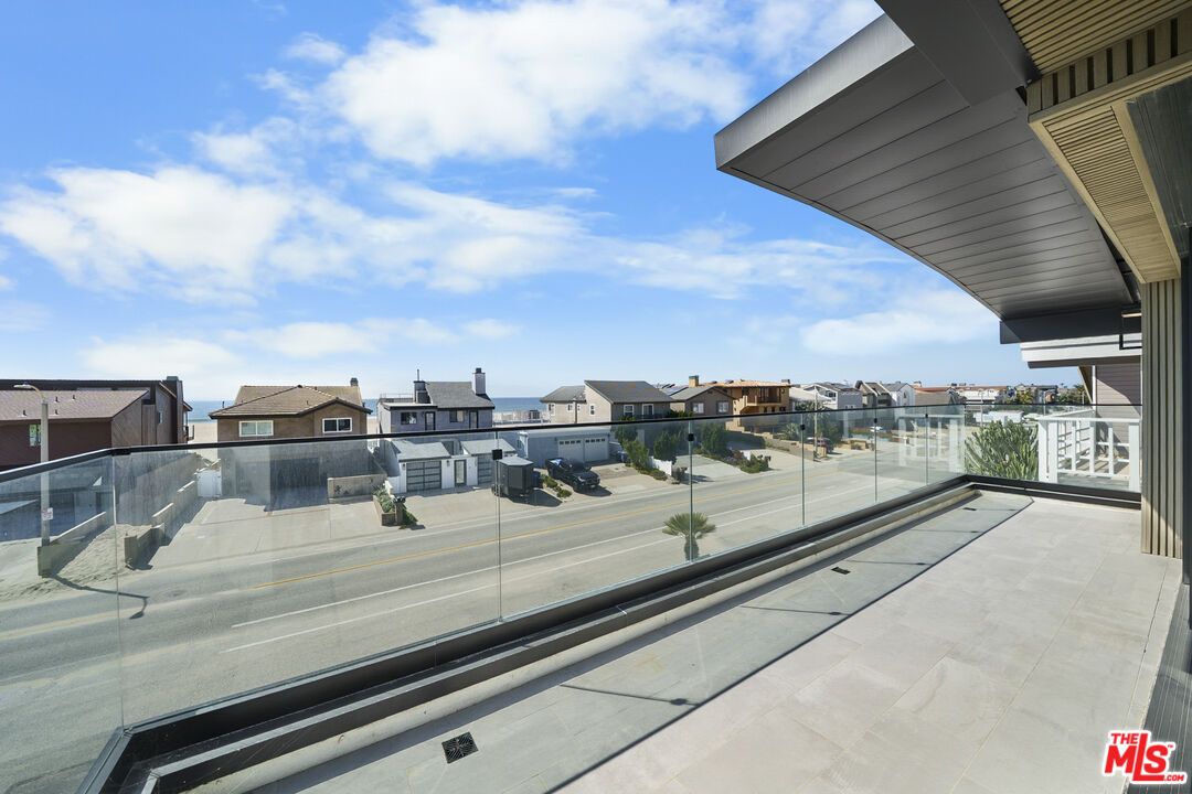 1500 Ocean Drive Oxnard, CA 93035 - Photo 55 of 75 a view of a balcony with an outdoor seating