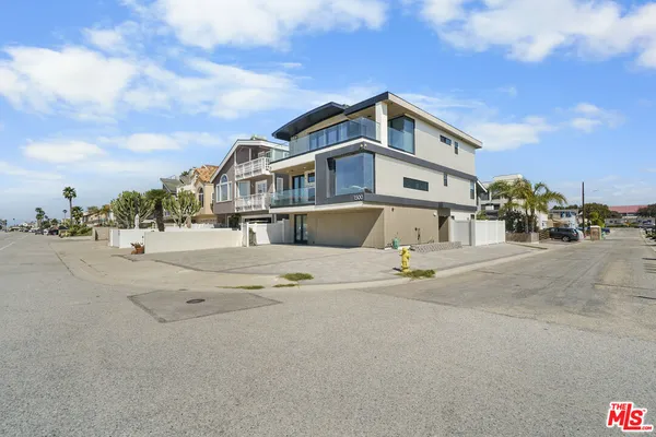 front view of a house with a street